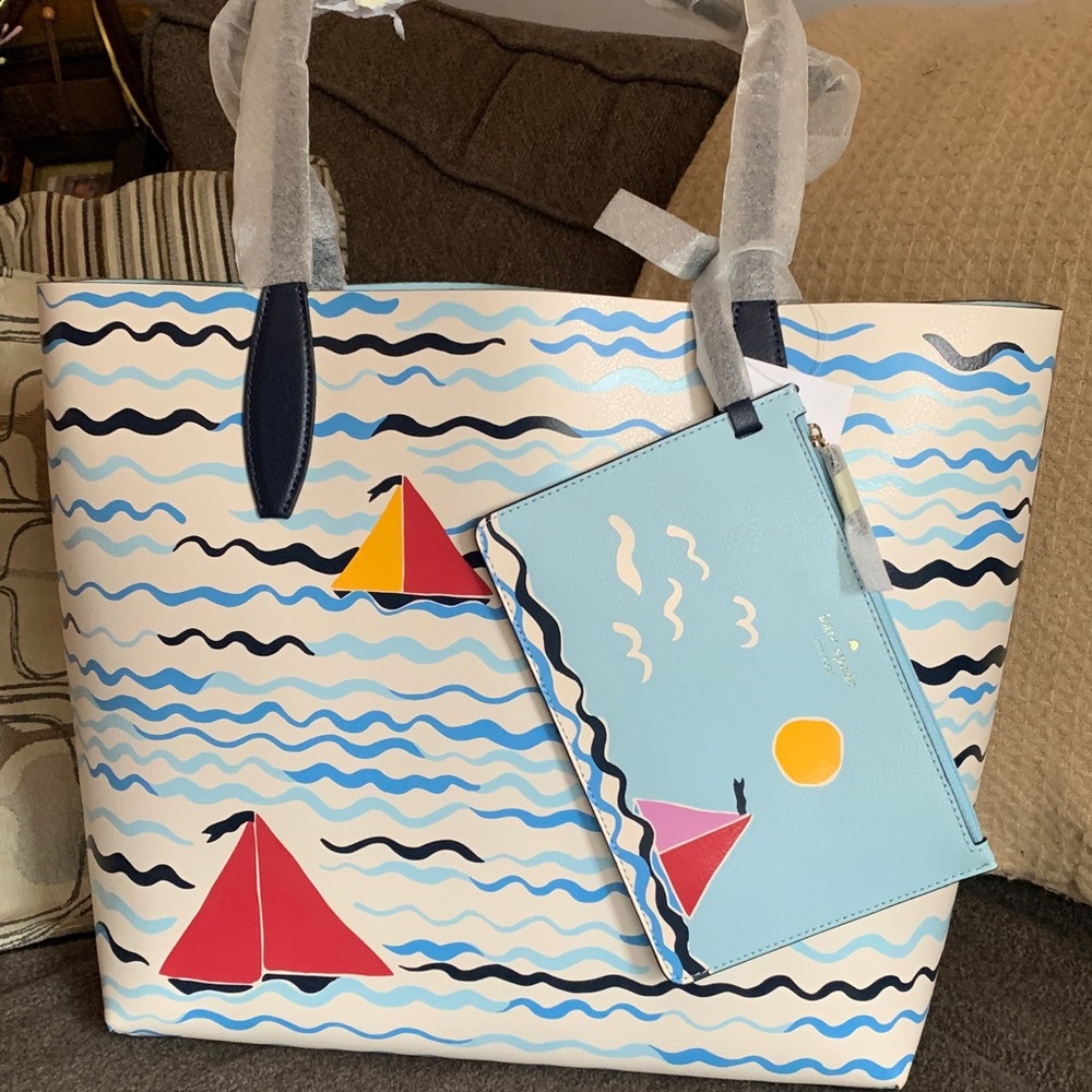 Authentic KATE SPADE Reversible Leather Sail boat print Tote/removable wristlet